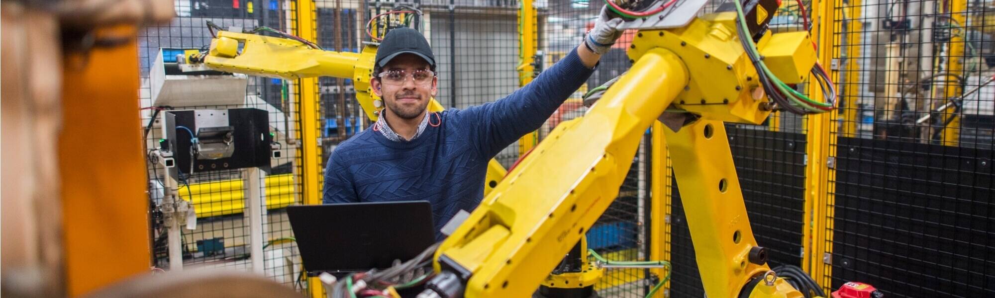 Engineering student with robot